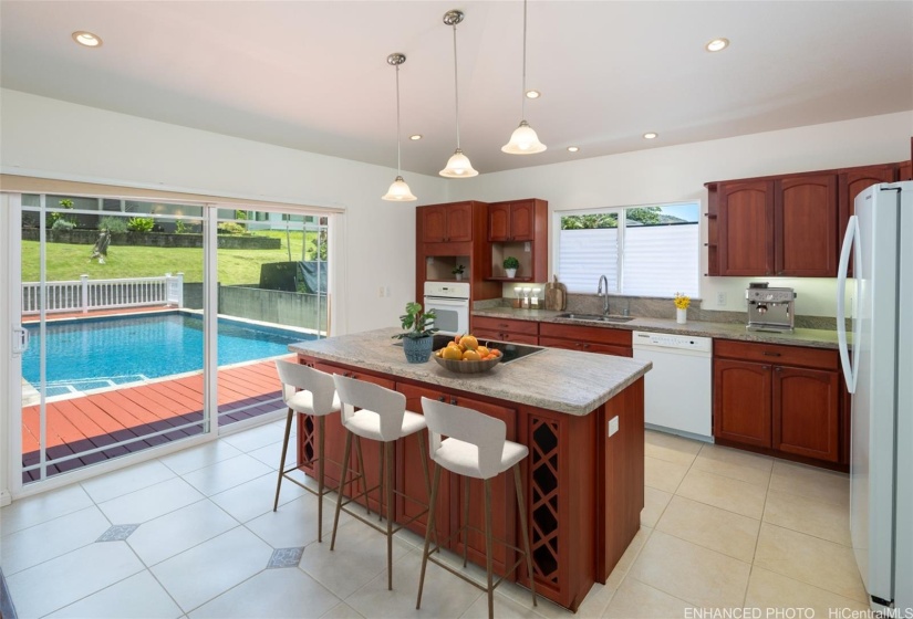 Cooks will love this open kitchen. You can entertain easily with the open floorplan.  Enhanced photo.