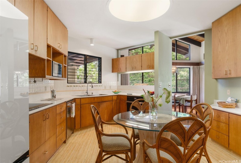Another view of the kitchen, many newer appliances, large pantry to the right here