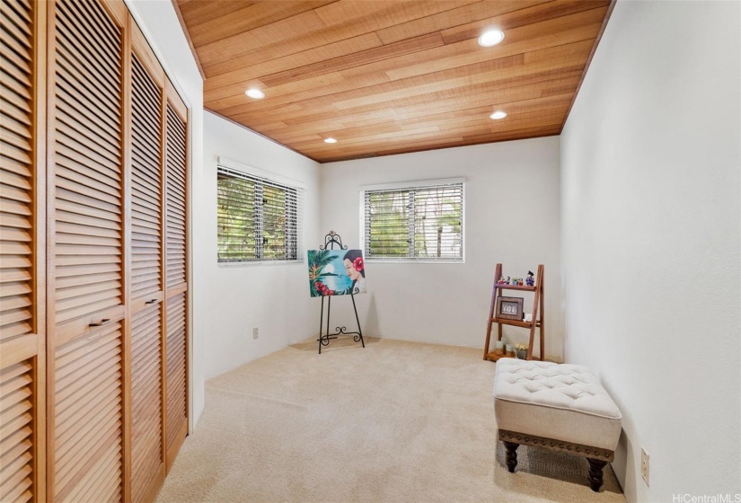 Hall bedroom, a total of 4 bedrooms.  All carpet just professionally cleaned.