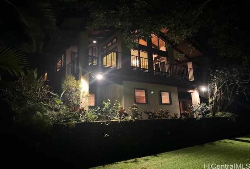 Night view from the rear, level yard area