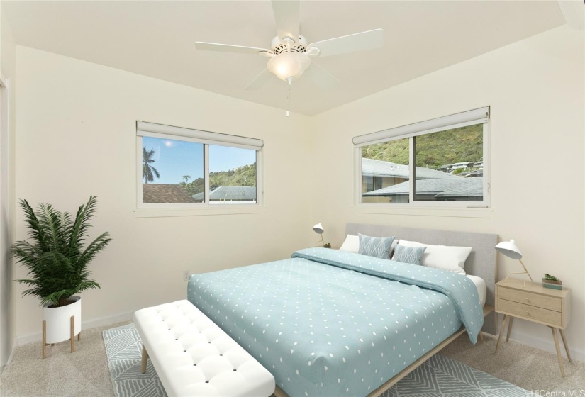 Bedroom 3 on the second floor features views of the city and valley. Photo is virtually staged.