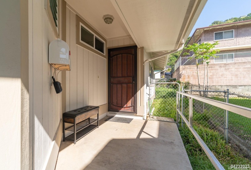 The covered entry leads into the two-bedroom, one-bath Ohana unit, offering privacy and a separate living area.