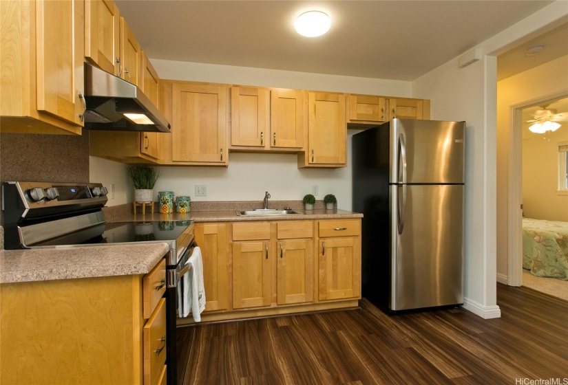 The kitchen in the Ohana unit offers plenty of counter space and modern appliances for efficient meal prep.