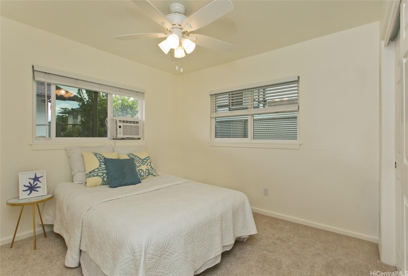 Bedroom 1 in the Ohana unit provides a cozy, comfortable space for relaxation.