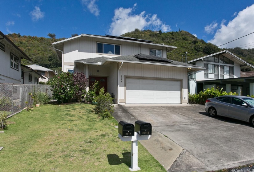 The home offers an oversized garage with parking space for two vehicles, plus plenty of street parking and additional room for two cars in the driveway