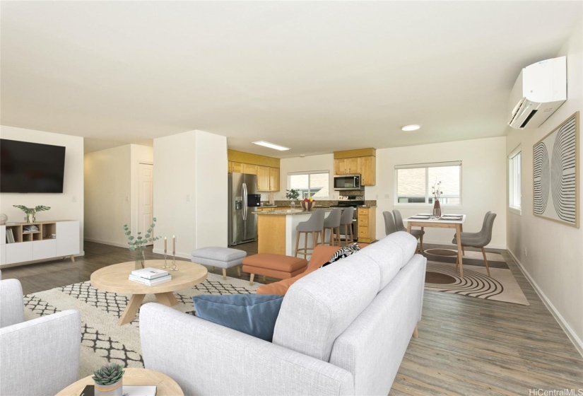 The large, light-filled living, dining, and kitchen areas feature ample natural light with scenic city and valley views. Photo is virtually staged.