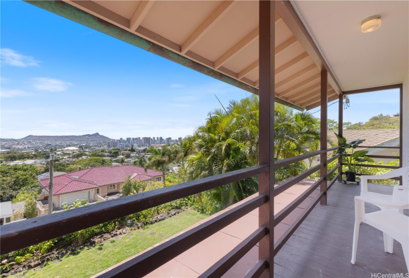 Lanai with chairs and beautiful views, located outside both Guest bedrooms