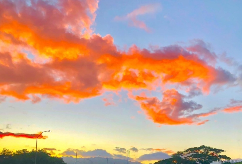 Views of colorful skies from Na Pali Haweo neighborhood in general and when you drive up and down Kamehame Ridge. This is a shot within the neighborhood not from the lot. Great place to view Hawaiian Skies and witness colorful sunsets and sunrises as you drive through the ridge on both sides.