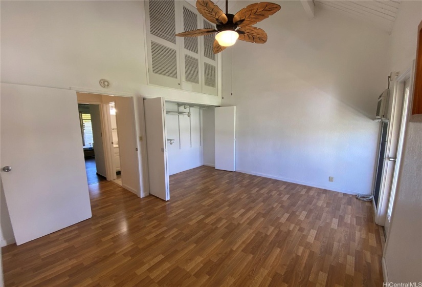 Master bedroom with large closet & storage loft above