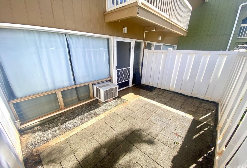 fenced in courtyard area off living room