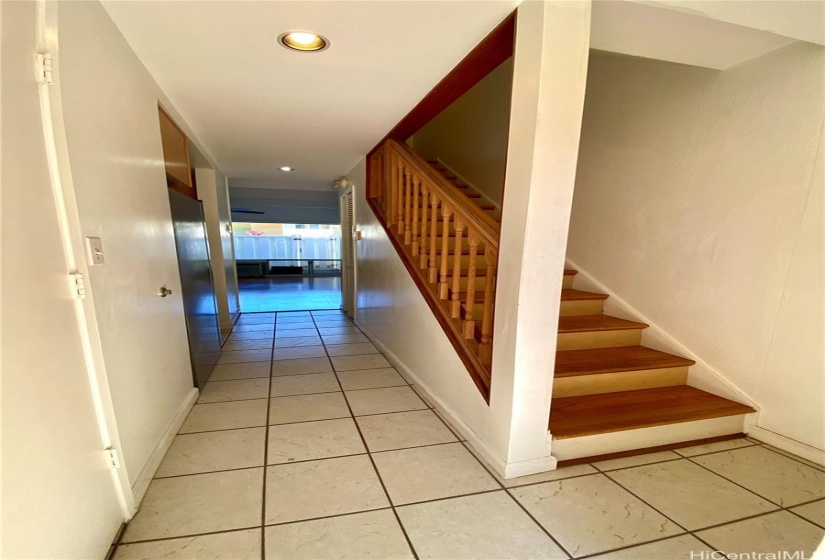 stairs leading upstairs, both bedrooms and full bath upstairs