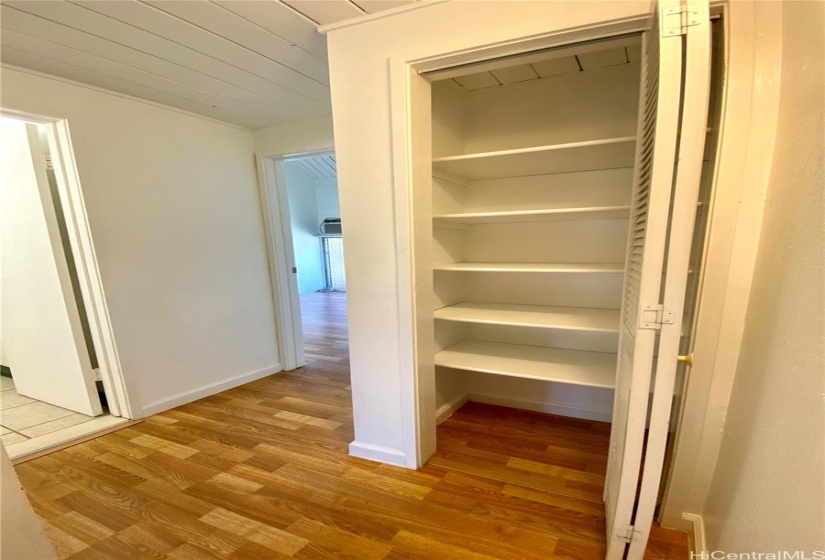 storage closet at the top of stairs