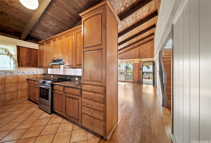 View of the kitchen and hallway leading to the main floor living area