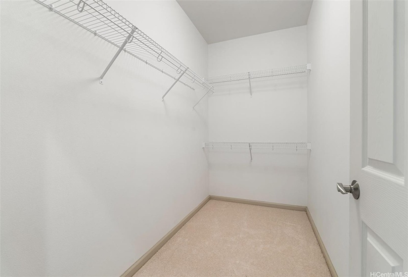 Large closet in primary bedroom.