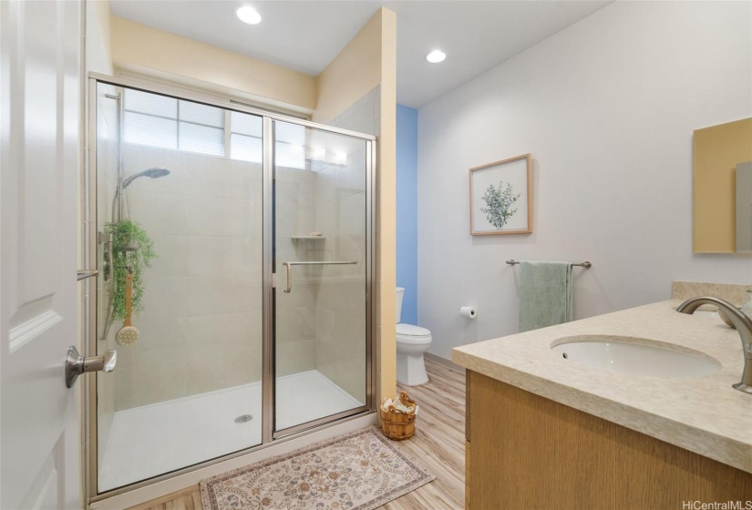 Large primary bath with shower.
