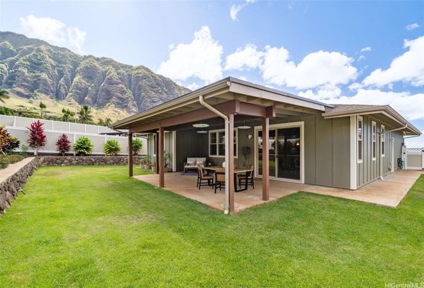 Beautifully landscaped backyard with mountain views.