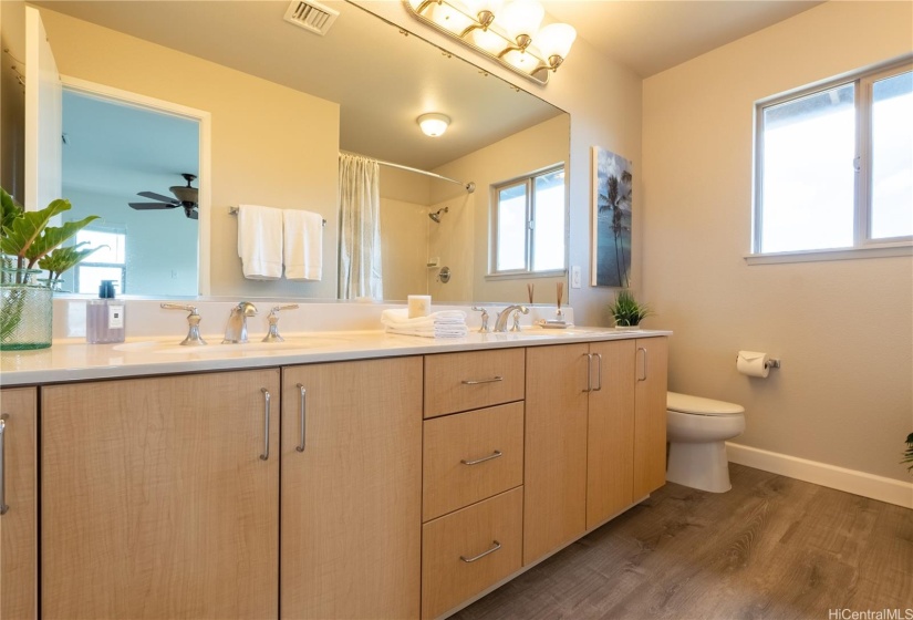 Primary bathroom with double vanity.