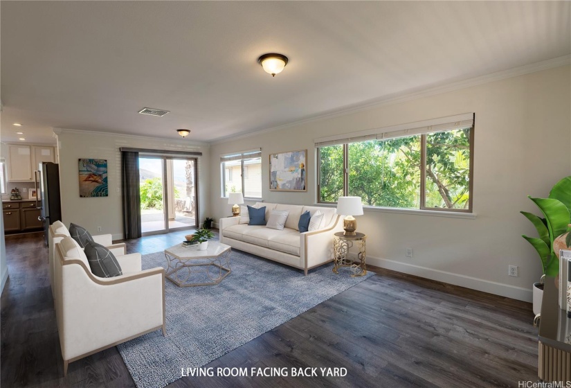 Living room facing the lanai and back yard.