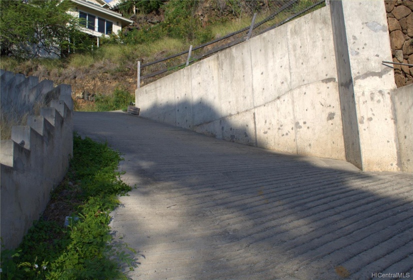 Steep but very solid upslope driveway.