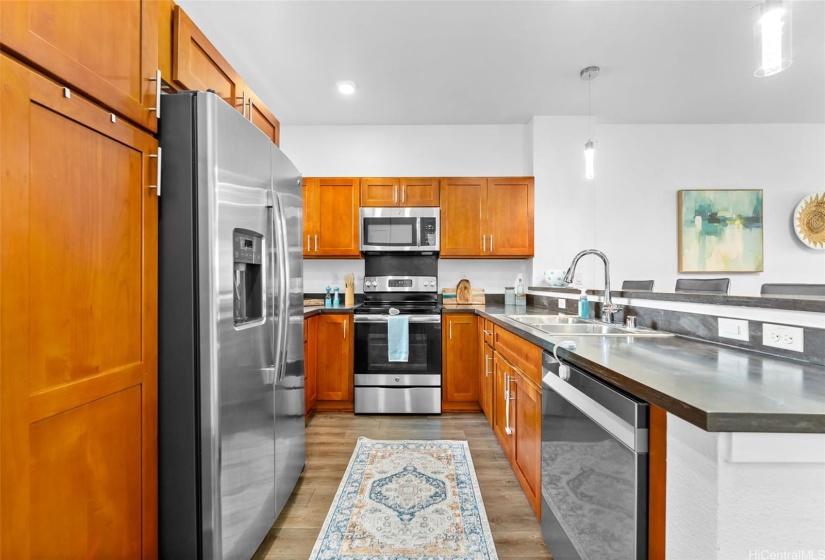 Kitchen w/ SS appliances.