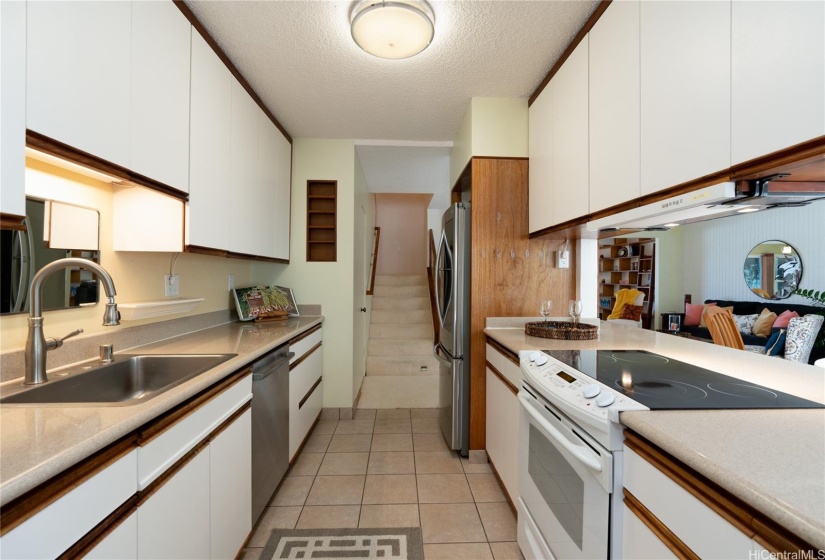 Lots of cabinet space.  There is a downstairs powder bath just beyond the kitchen on the left.