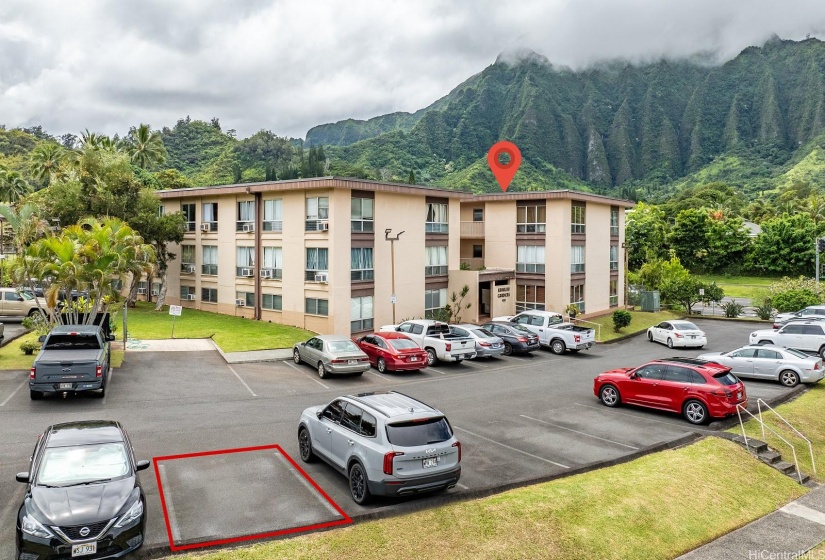 Parking stall convenient to building entry and car wash area.