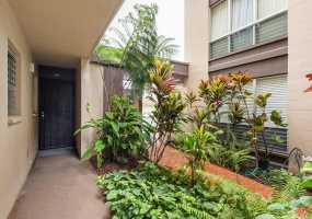 Lush landscaped entry to your front door.