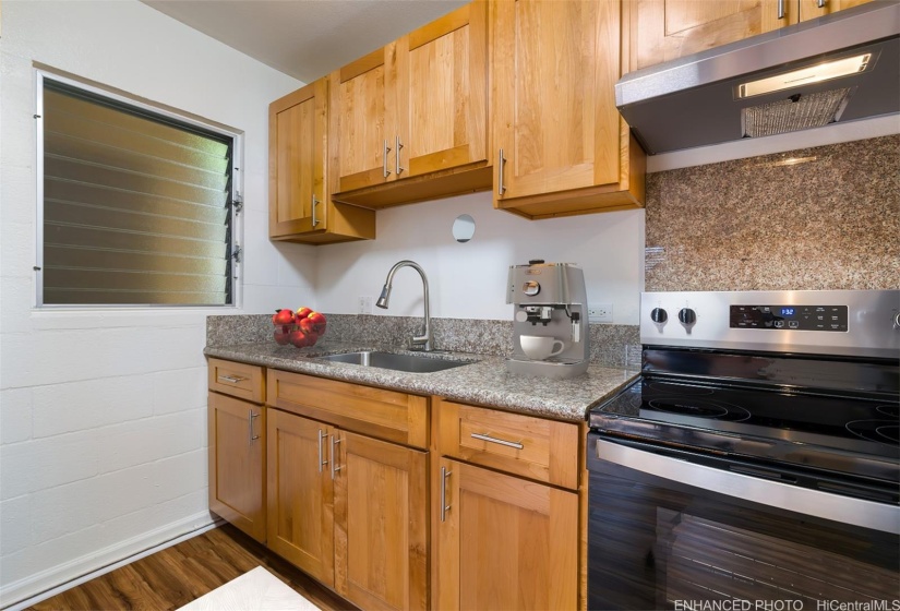 Family chef can enjoy cooking in this kitchen.  (Enhanced photo)