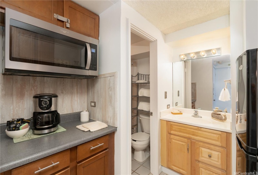 Kitchenette includes refrigerator and microwave. **PHOTOS HAVE BEEN ENHANCED**