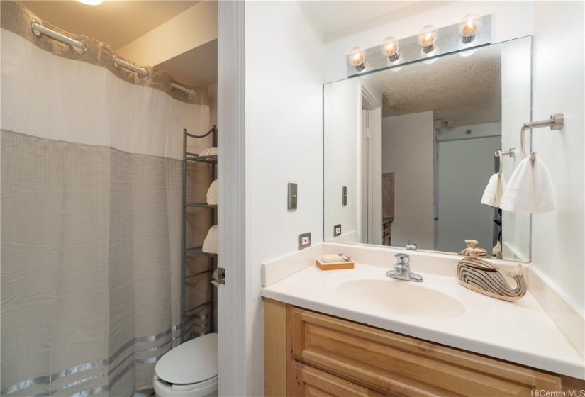 Bathroom and sink area. **PHOTOS HAVE BEEN ENHANCED**