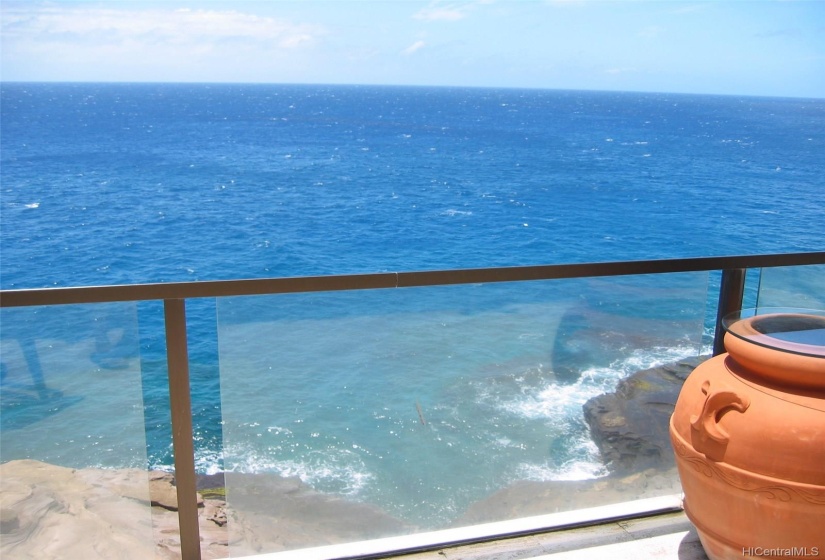 Imagine gazing at the azure water from your lanai (photo from previous home which was removed). Design the home you have dreamed about!