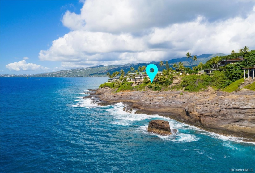 Dramatic views of the waves swirling along the lava rock coast.