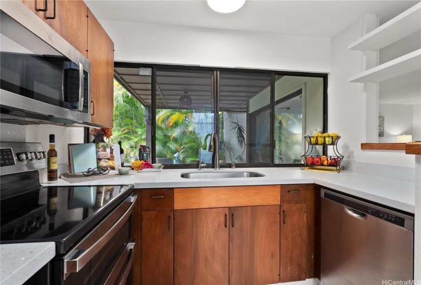 Kitchen overlooks the patio and koi pond