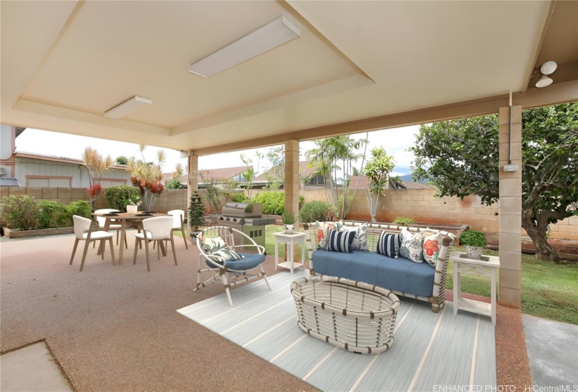 Enhanced.  Spacious covered patio for your fun gatherings!
