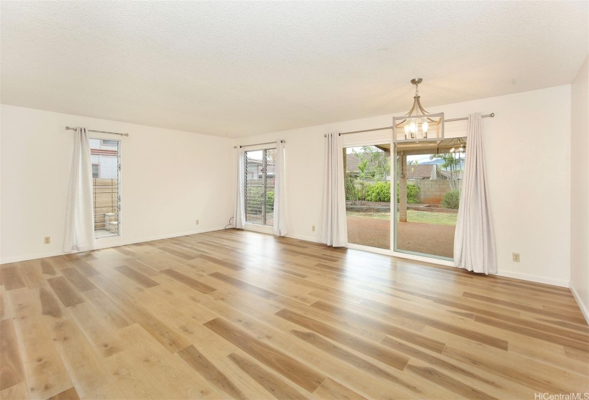 Living area flows out to your oversized covered patio.