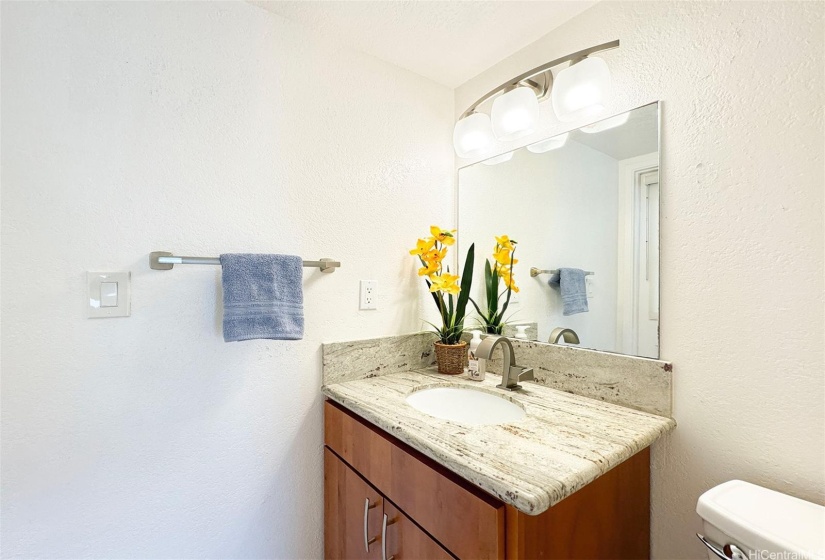 Downstairs half a bathroom.