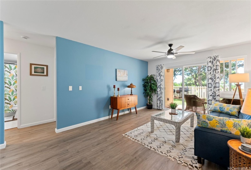 Living Room with double pane, energy efficient windows and vinyl plank flooring