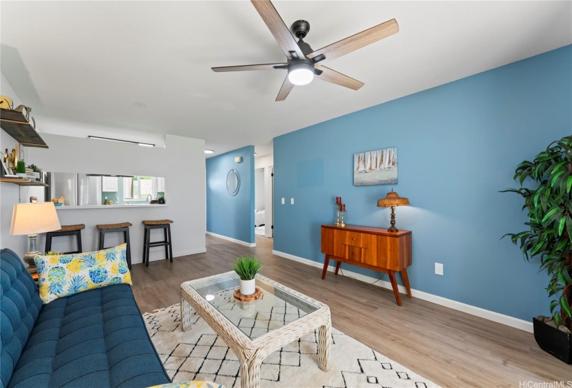 Living Room with double pane, energy efficient windows and vinyl plank flooring