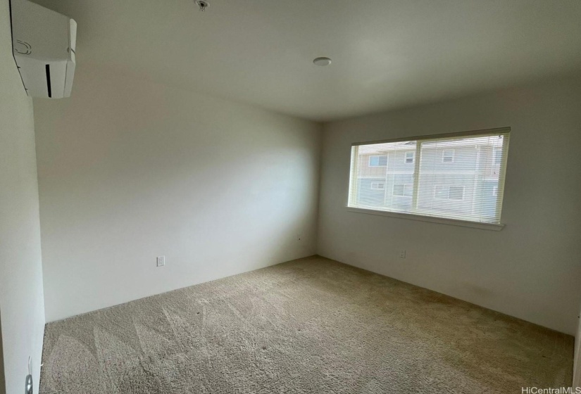 Downstairs master bedroom with walk in closet & attached bath