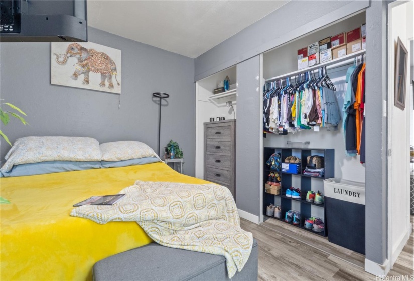 Primary bedroom with half bath and a/c