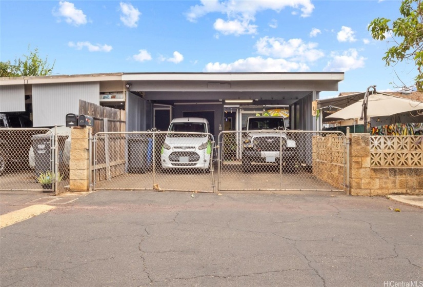 Carport gated entry with storage