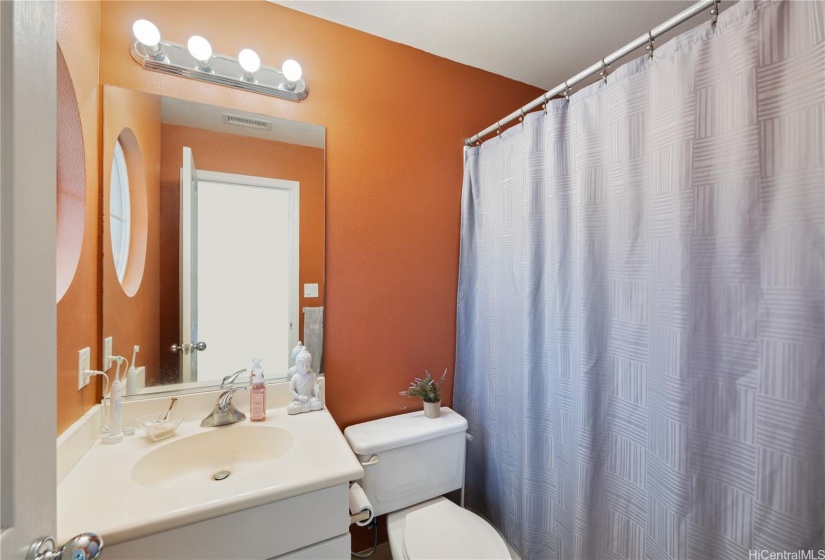 Bedroom 2 bathroom with tub/shower combination.