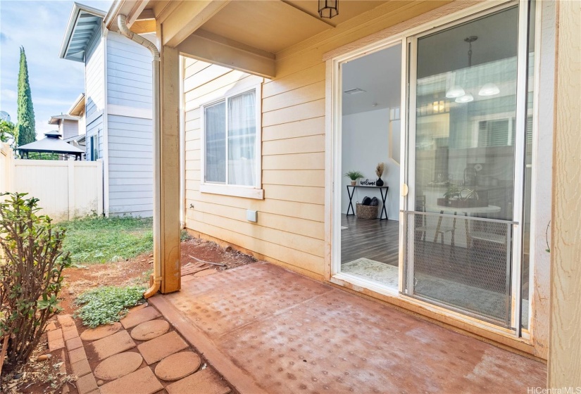 Charming covered patio and back yard