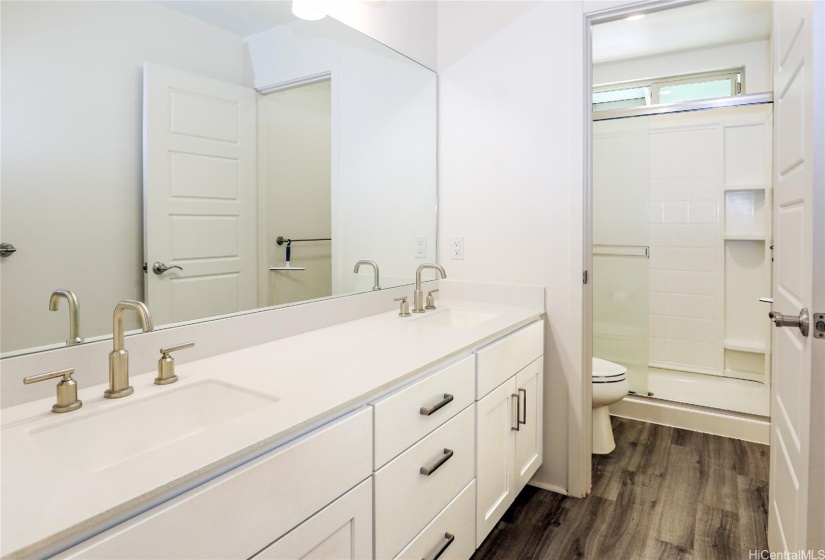 Upstairs primary bathroom with double sink