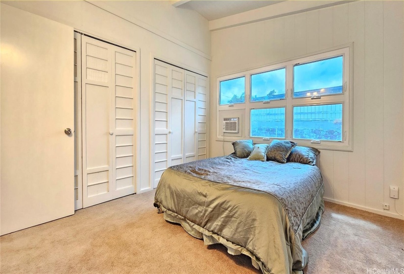 The master bedroom also features vinyl awning windows and a new AC.