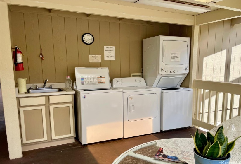 The community laundry areas are located on both floors.