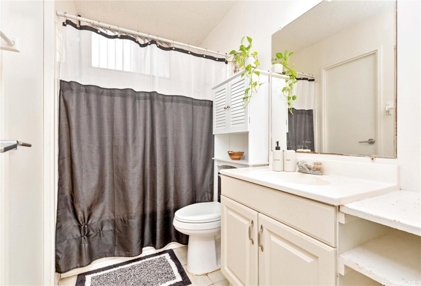 Bathroom with access to the large walk-in closet