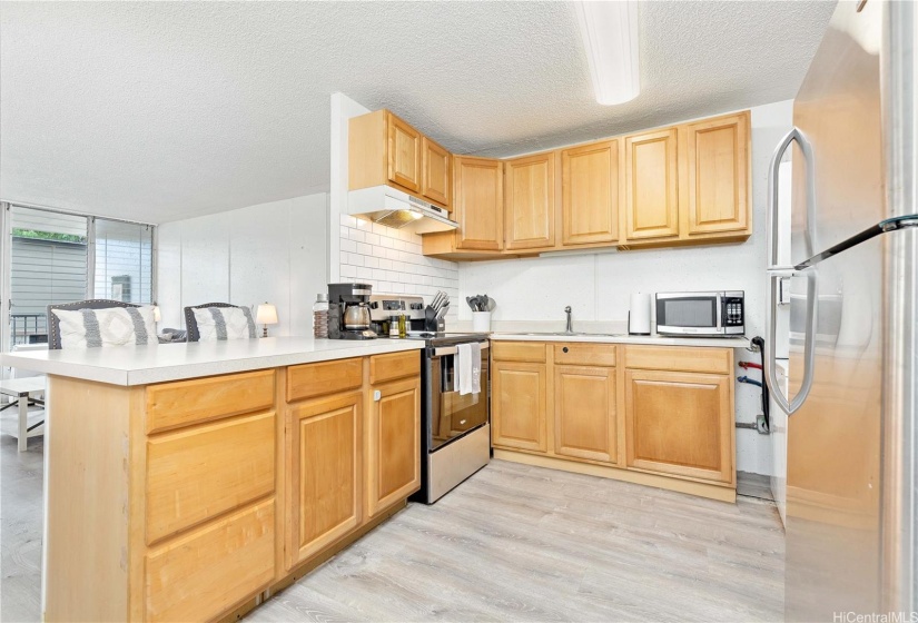 Kitchen with a new oven installed in 2023