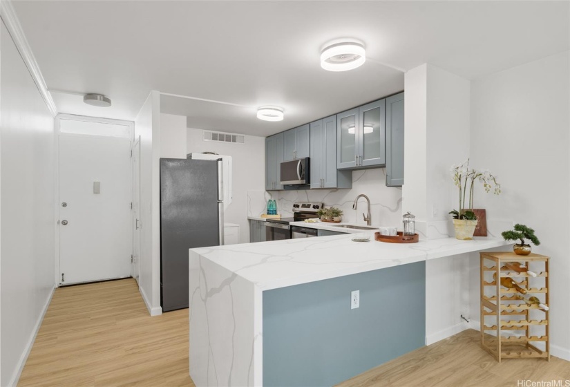 Perspective toward the entry hallway and condo entry door.