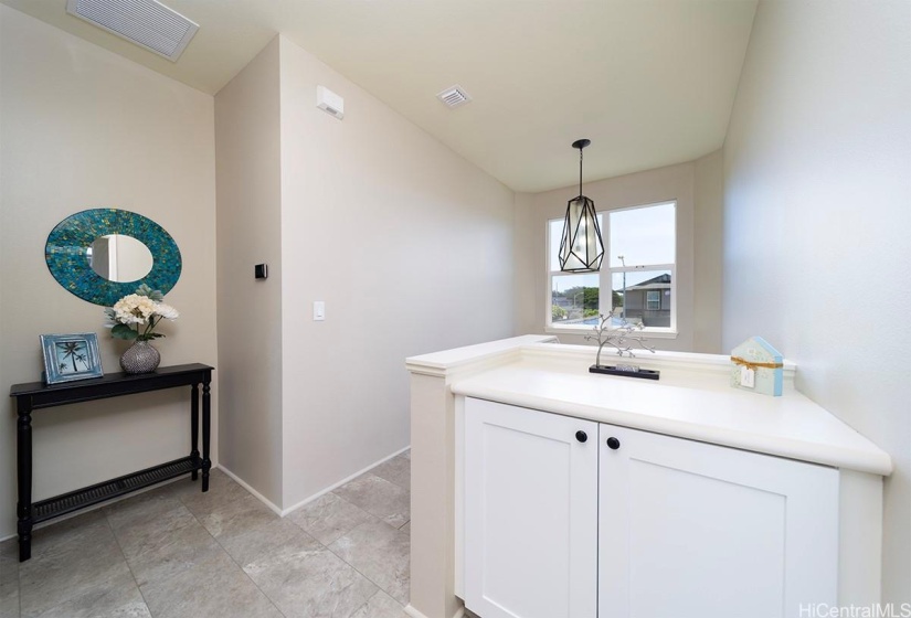 Upstairs looking towards the stairs. Nice open area with more storage. Linen closet is just down the hall.